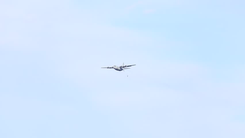 c130 Hercules paratroops drop action  