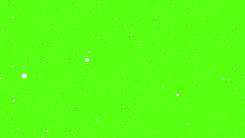 White particles flying on green chroma key background. Winter snow, falling snow animation loop