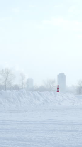 Sliding on an ice line. Snow drifting. Footage. Sport car racing on snow race track in winter. Driving a race car on a snowy road.
