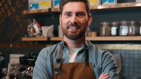 Happy Caucasian small business owner guy worker barista man portrait smile posing looking at camera in coffee house indoors positive adult male employer crossing arms waiter cafeteria occupation work - Powered by Shutterstock - Get 15% off with code: PIKWIZARD15