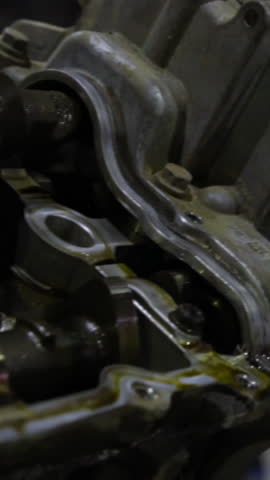 The disassembled car engine. Footage. Old auto engine in service in repair.