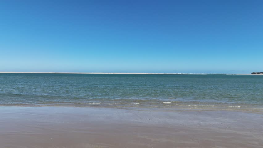 Coorong National Park – 4K aerial drone footage from Murray Mouth Lookout, Hindmarsh Island, Goolwa, South Australia, featuring an Australian pelican on the ocean