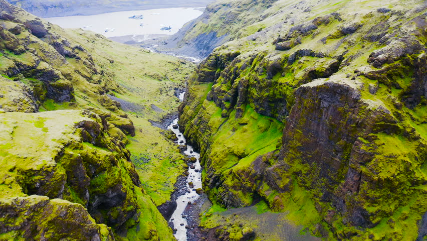 Aerial view of beautiful canyon close the lagoon in front of the Solheimajokull glacier in southeast Iceland.