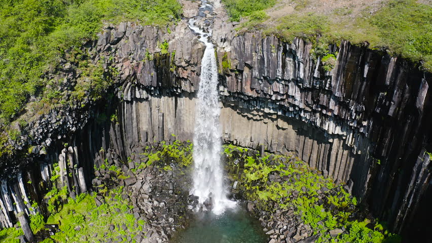 Aerial view of the spectacular Svartifoss waterfall, into the Skaftafell area of Vatnajokull National Park provides visitors with a breathtaking view of Svartifoss (Black Falls).