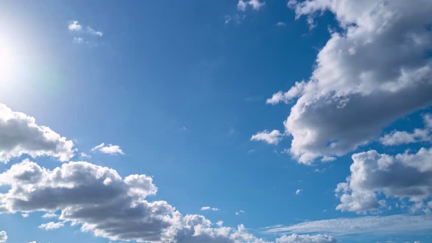 Blue Sky timelapse. Moving clouds and sun. 4K Time lapse. The Sky with clouds. Cloud cloudscape time-lapse. Blue sky time lapse. Nature weather with blue sky.