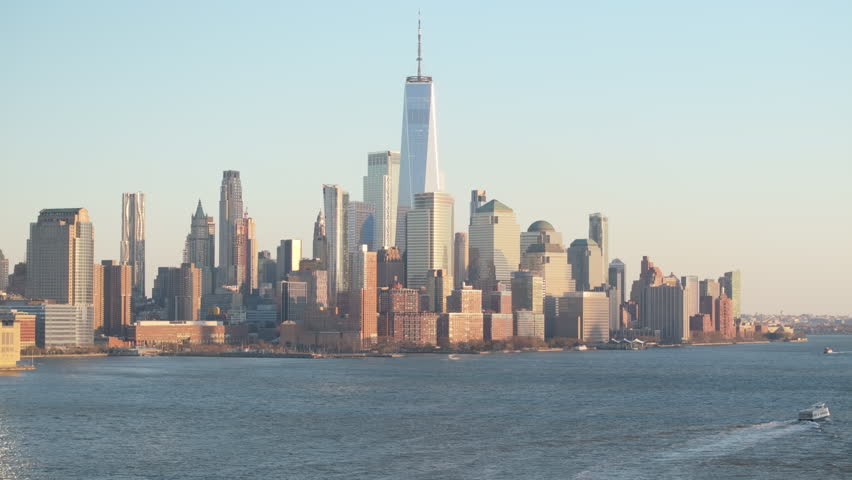 Aerial view of The World Trade Center at dusk. Shot along The Hudson River in New Jersey.