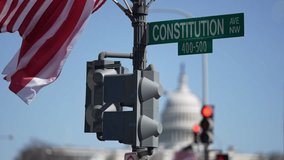 American construction flag waving. American construction at Capitol. Capitol in Washington DC. American construction site in Capitol. Construction and democracy in action. Vote and elect in America. - Powered by Shutterstock - Get 15% off with code: PIKWIZARD15