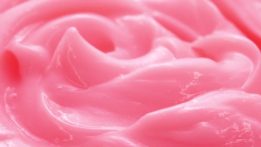 Macro pink smooth eye, skin cream texture, close-up beauty facial cosmetics mask. 4k footage