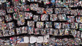 Piles of sorted recycled materials at a waste management facility - Powered by Shutterstock - Get 15% off with code: PIKWIZARD15