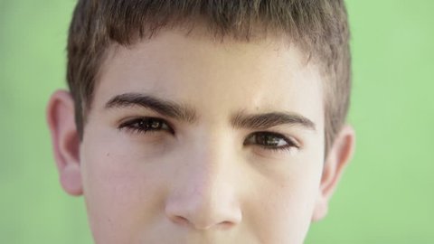 Young people and emotions, portrait of serious kid looking at camera