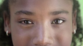 Portrait of black people, pretty happy young african american girl looking at camera and smiling. Sequence - Powered by Shutterstock - Get 15% off with code: PIKWIZARD15