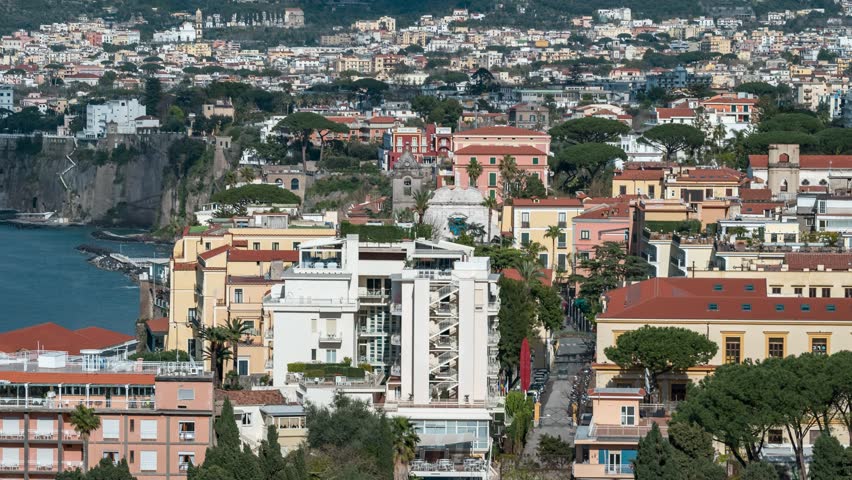 Timelapse of daily life in the streets of Sorrento, with people and cars in motion. Naples, Italy.