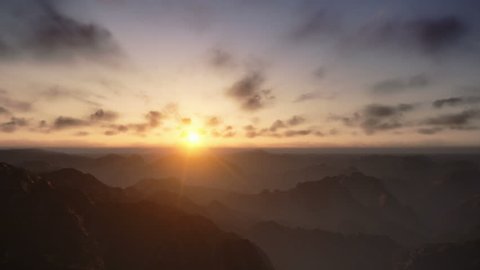 Flight over Mountains Peaks, Sunset Time Lapse