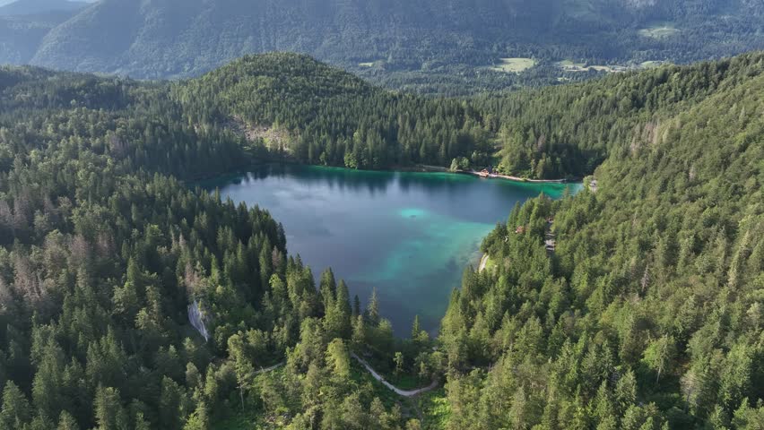 An aerial view of the Alpine Lakes of Fusine (Laghi di Fusine) in Tarvisio, Udine Province, Italy on a sunny day