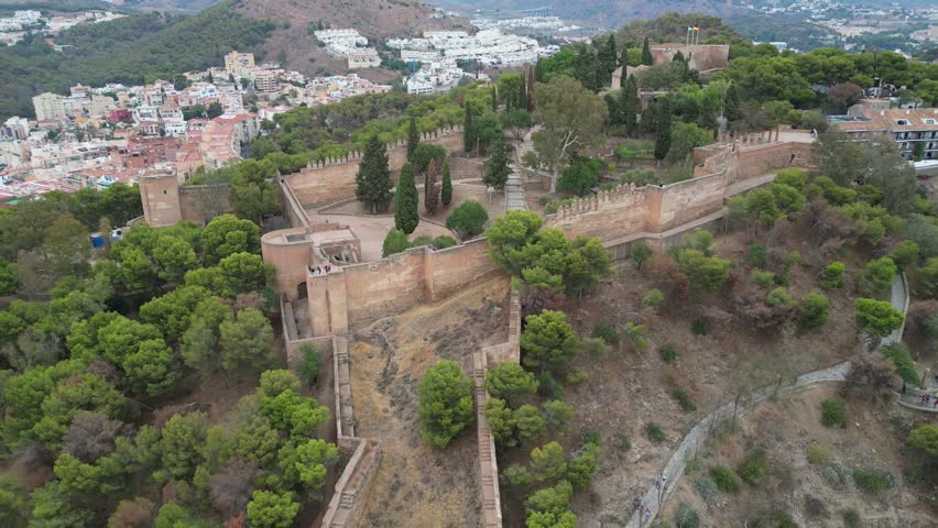 view of the beautiful castle of Gibralfaro from the Islamic period in the city of Malaga, Andalusia.