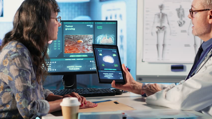 Meeting between doctor and patient to examine MRI scan showing a tumor, exploring treatment options, including immunotherapy, chemotherapy and preventative medicine. Risk factors. Camera B.