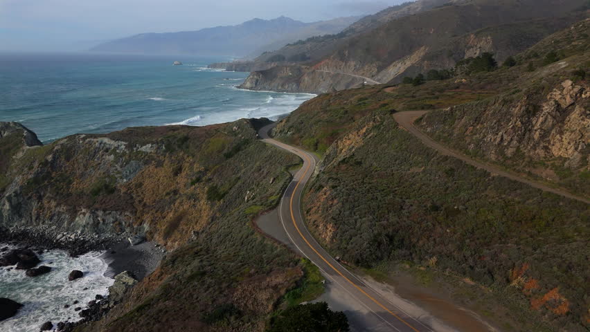 Discover Big Sur, Californiaan unforgettable destination with stunning coastal landscapes, winding roads, and beautiful ocean views, particularly at sunset. A mustvisit for every traveler