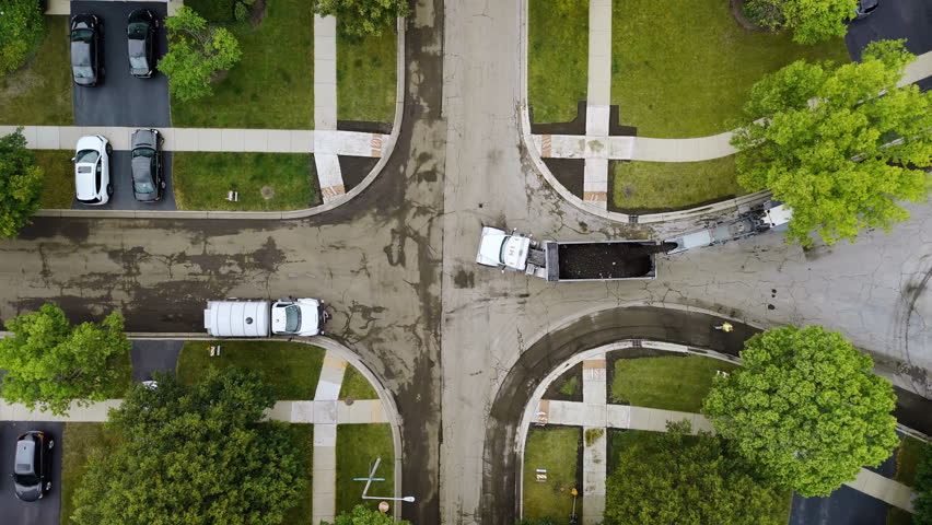 Roadwork development new asphalt road and real estate houses at Suburban. Wide Drone top down view
