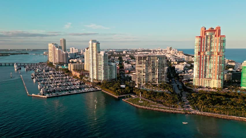 Miami south beach aerial sunset. Skyscraper at south pointe park. Luxury hotel skyscraper. Aerial Miami beach. Luxury aerial sunset. South pointe. Skyscraper architecture of Miami. Sunset marina