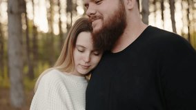 A loving couple hugs tightly, surrounded by a golden autumn forest, sharing a moment of intimacy and affection. Romantic Couple Embracing in a Serene Autumn Forest - Powered by Shutterstock - Get 15% off with code: PIKWIZARD15