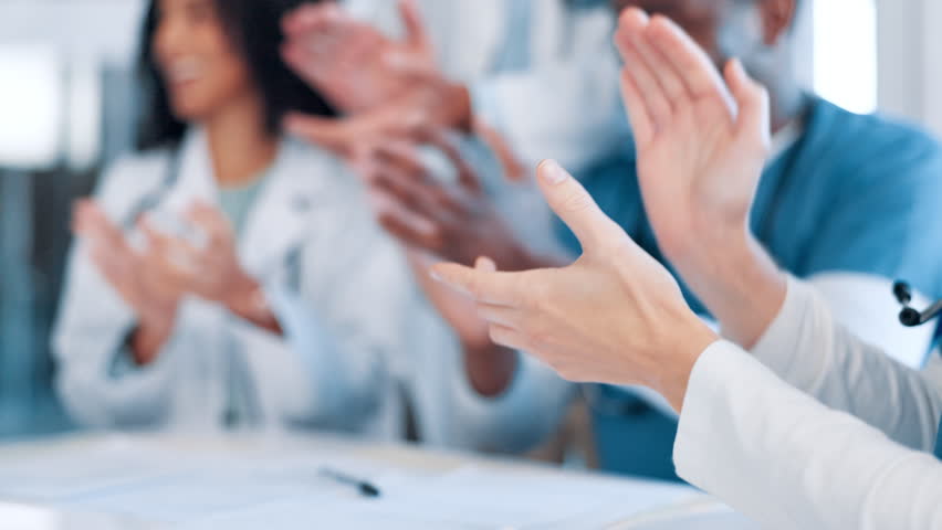 Hands, doctors and applause for team support, celebrate and praise with pride from professional medical group. Healthcare, seminar or workshop with people clapping for cheers, success and motivation