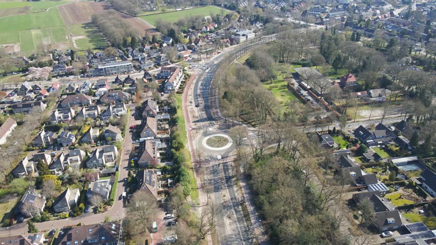 Beautiful aerial overview of a calm roundabout in a small town in the Netherlands on a sunny day