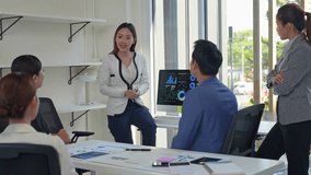 Business professional presenting strategic project to diverse team, analyzing data and fostering collaborative engagement in modern corporate workspace - Powered by Shutterstock - Get 15% off with code: PIKWIZARD15