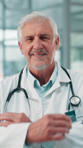 Doctor, face and mature man with arms crossed at hospital for healthcare treatment, laughing and professional career. Medicine, expert and happy in portrait for medical help, service and cardiology