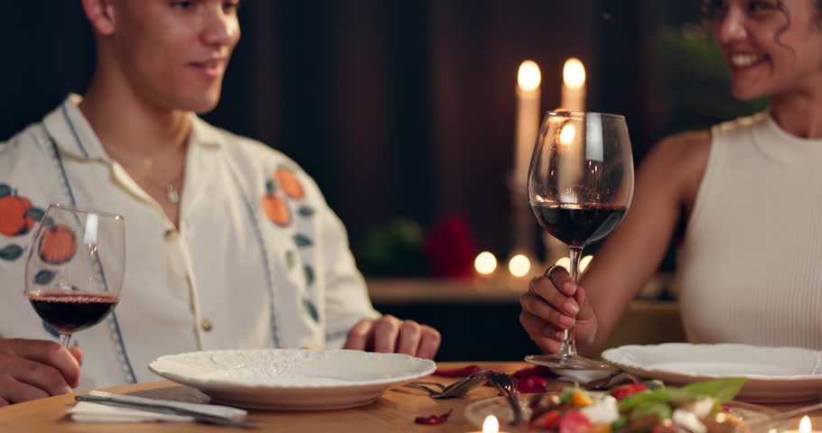 Happy, couple and cheers with red wine at restaurant of romance, valentines day date and celebration. Smile, people and toast alcohol of anniversary, commitment and fine dining of hospitality service