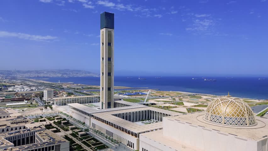 drone shot of the great mosque of algiers with the sea view in the background on a sunny day - Algeria
