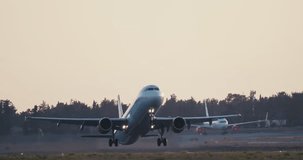 Satisfying Aircraft Takeoff from Airport Runway for Passenger Air Travel Tourism and Aviation Adventure Over Global Destinations. High quality 4k footage - Powered by Shutterstock - Get 15% off with code: PIKWIZARD15