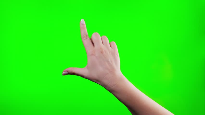Close-up of hand gestures on a touchscreen entering the frame, zooming in by opening the fingers on green chroma key background. High quality 4k footage