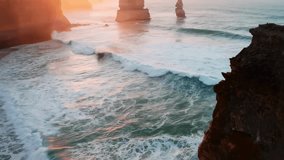 Stormy Sunset Waves Crashing on Coastal Cliffs. - Powered by Shutterstock - Get 15% off with code: PIKWIZARD15