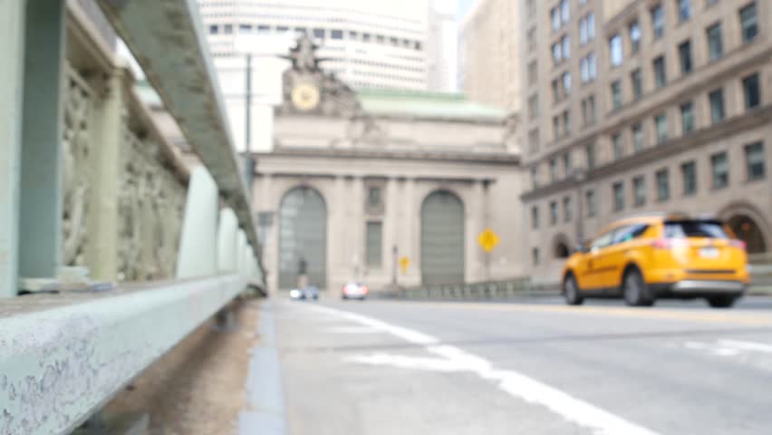 New York City Grand Central Terminal railway station building architecture, 42 street. Manhattan Midtown. Yellow taxi cab, car transport, Pershing Square bridge, NYC, USA. American urban road traffic.