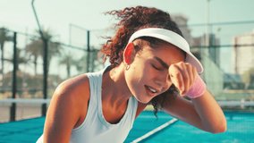 Sports, tired and woman with sweat on tennis court for game, match and competition for practice. Fitness, exhausted and person with fatigue, breathe and rest for training, exercise and workout - Powered by Shutterstock - Get 15% off with code: PIKWIZARD15