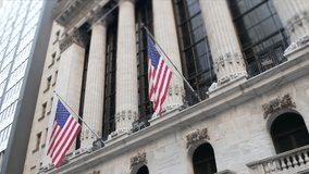 New York City, United States. Lower Manhattan Downtown Financial District urban architecture exterior. American flag. Wall street Stock Exchange building facade columns, USA Stock Market trading, NYC. - Powered by Shutterstock - Get 15% off with code: PIKWIZARD15