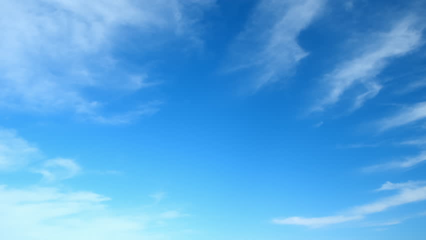 Perfect blue cloudy sky with fleecy cirrostratus clouds floating in round. Heaven paradise.