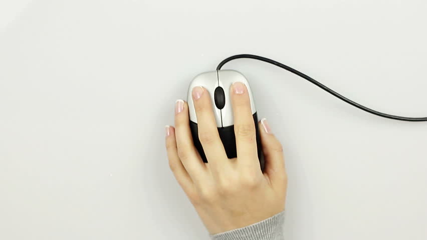 Woman's hand using computer mouse