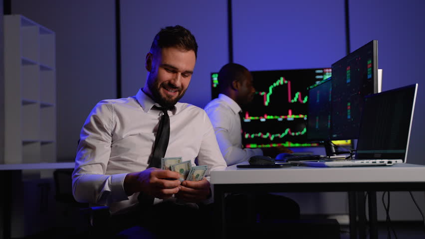 Smiling trader counting money after cryptocurrency market profits