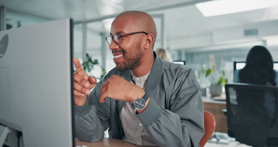 Computer, fist pump and target with business black man at desk in office for achievement or deal. Bonus, success and winner with excited employee in workplace for celebration of milestone goals