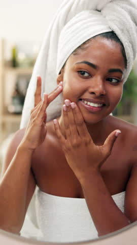 Beauty, woman and check face in mirror for acne treatment results, natural glow and skincare benefits. Reflection, african person and happy with skin inspection for spot healing and self care in home