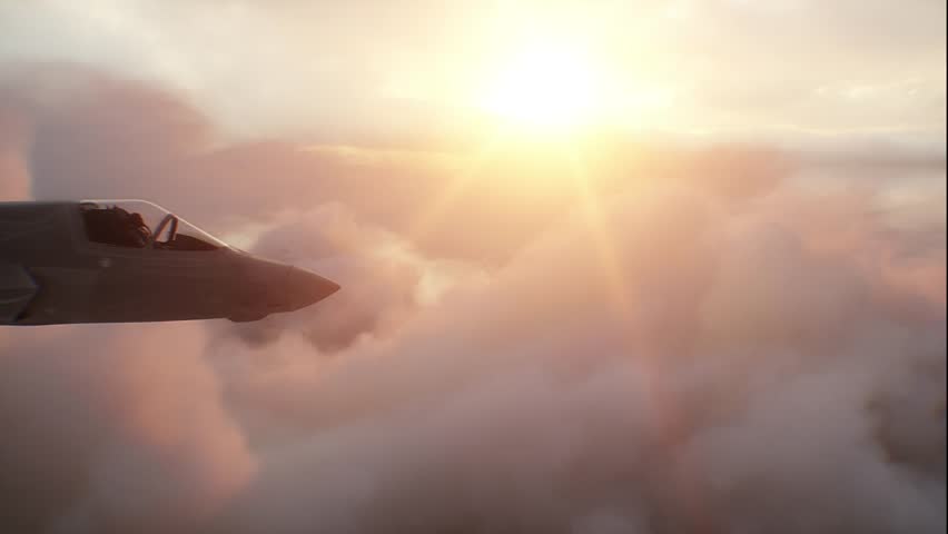 Military fighter jet flying over clouds. Air force.