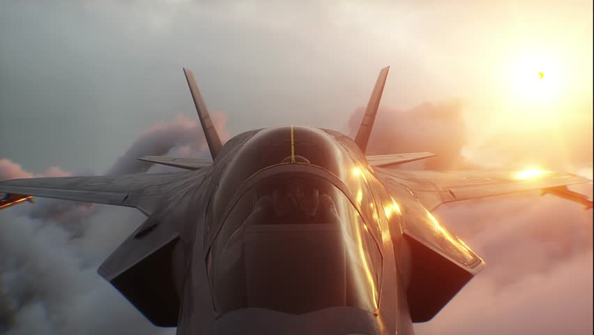 Military fighter jet flying over clouds. Air force.