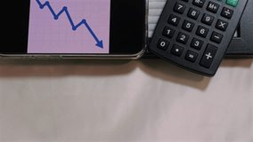 Recession in Black Letters on Board with American Flag and Declining Bar Chart with Calculator - Powered by Shutterstock - Get 15% off with code: PIKWIZARD15