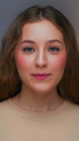 Portrait of Young Woman Eating Sweet Food as Looking at Camera. Real Person on Diet Consuming Milk Ice Cream as Lunch Snack. Attractive Female Human Inside Cozy Living Room Alone with Sugary Milky Bar