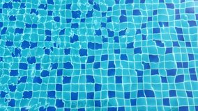 Refreshing blue water shimmers in the sunlight at a serene swimming pool on a clear summer day - Powered by Shutterstock - Get 15% off with code: PIKWIZARD15