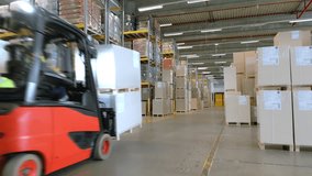 A forklift navigates an expansive warehouse, highlighting the efficient organization and movement of goods in a vast storage facility. - Powered by Shutterstock - Get 15% off with code: PIKWIZARD15