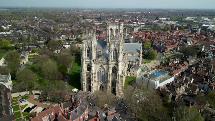York Minster, formally the Cathedral and Metropolitical Church of Saint Peter in York, is an Anglican cathedral in the city of York, North Yorkshire, England. 4k, high quality aerial video.