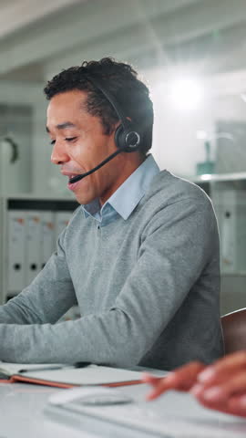 Call center, man and customer service in office with help desk, communication and online consultant. Contact us, headset and technical support crm, discussion or sales agent coworking for hotline