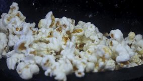 Classic fried popcorn vending machine. Hot popcorn popping energetically out of a popcorn machine.  - Powered by Shutterstock - Get 15% off with code: PIKWIZARD15